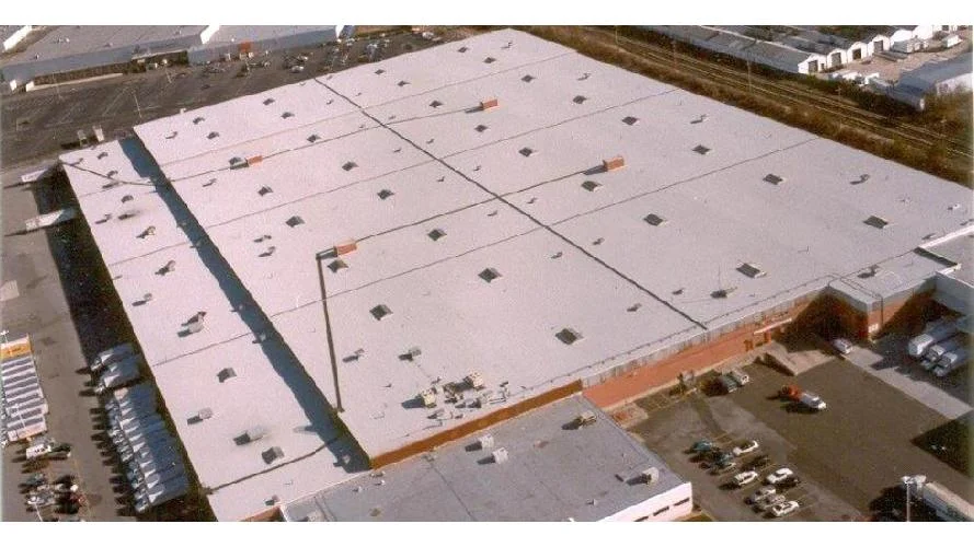 Commercial flat roof specialist on Long Island installing EPDM membrane — All-Star Roofing Inc. Amity Harbor